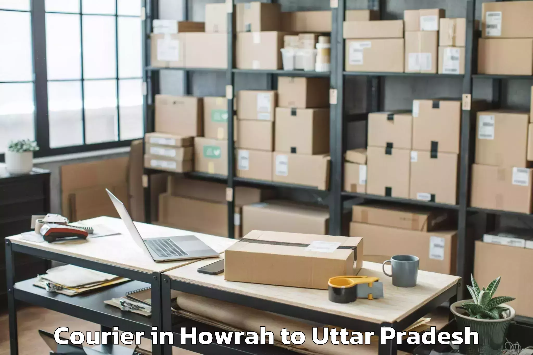 Affordable Howrah to Bajna Courier